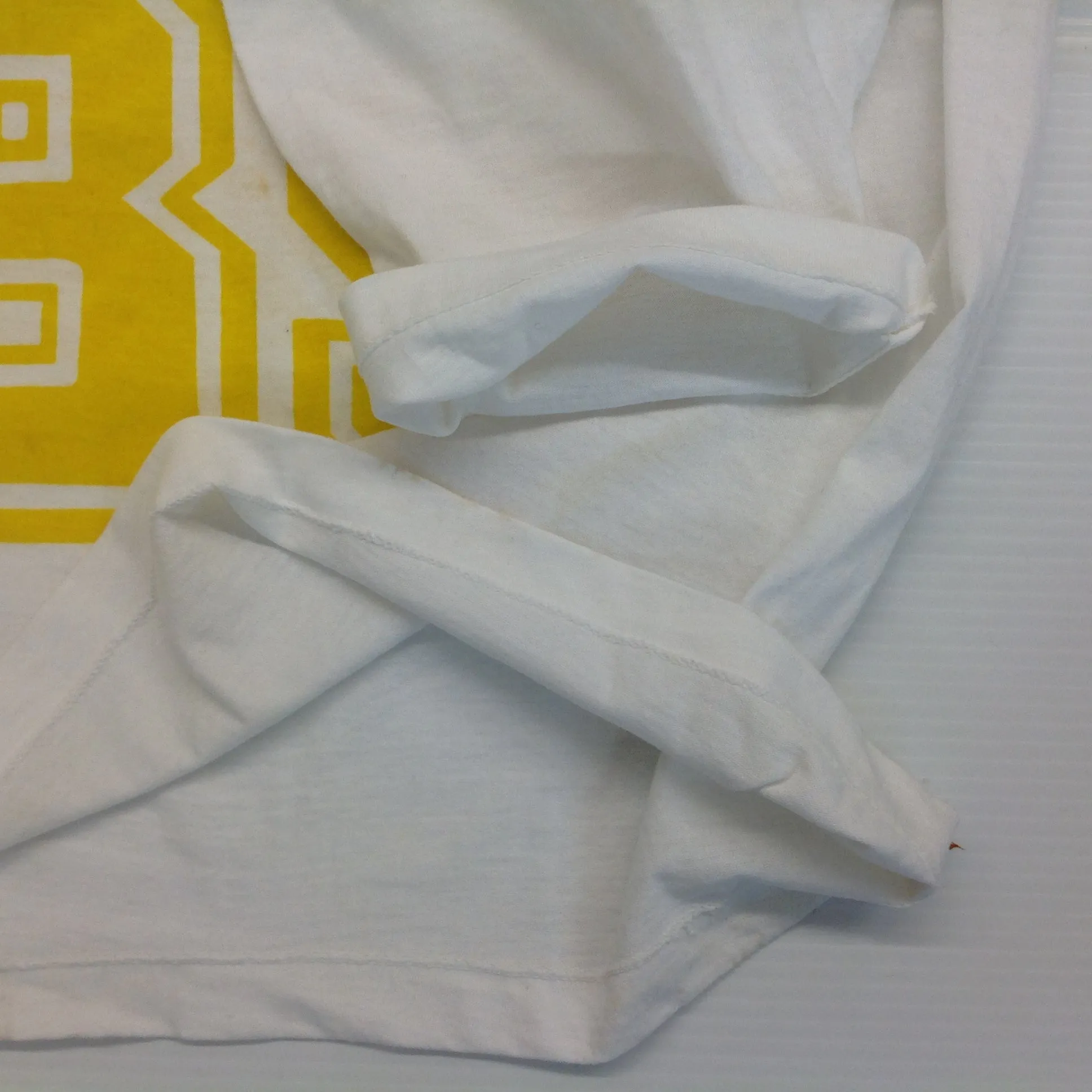 Vintage 1980's Novelty T-Shirt STAYING ALIVE IN 85 Yellow on White Katharine Hamnett